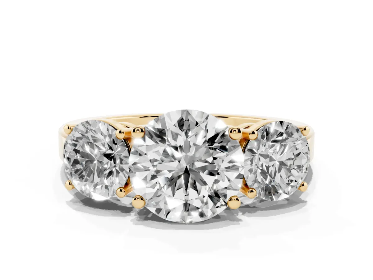 Three-Stone Round Cut Cut Diamond Engagement Ring with Flat Band and Four-Prong Setting Yellow gold