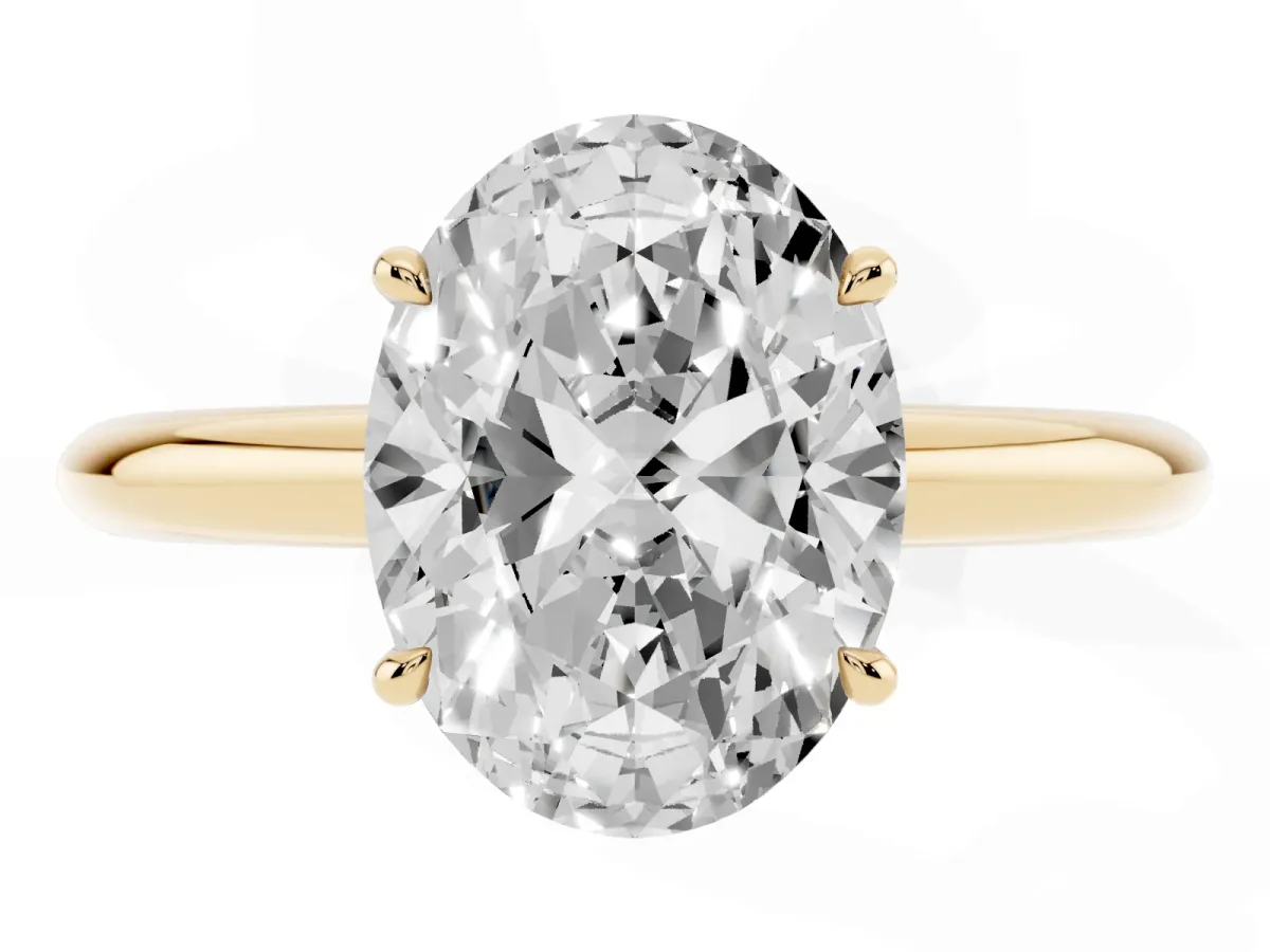 Oval Cut Brilliant Solitaire Engagement Ring with Six-Prong Setting and Classic Band Yellow gold