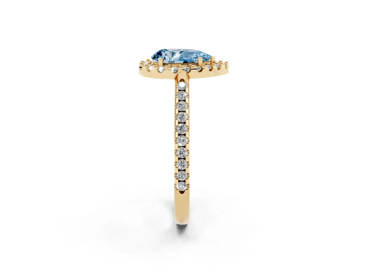Fancy Blue Pear Cut Diamond Pavé Halo Ring with Four-Prong Setting Yellow gold
