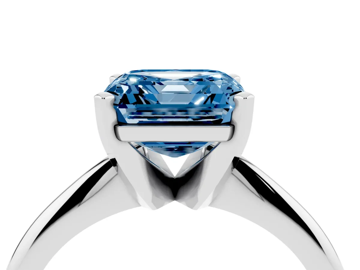 Fancy Blue Asscher Cut Cut Solitaire Ring with Four-Prong Setting on a Classic Band Platinum