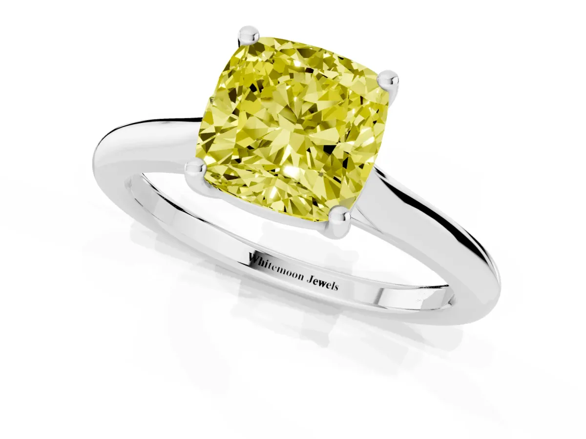 Fancy Yellow Cushion Cut Cut Solitaire Ring with Cathedral Band and Four-Prong Setting Silver