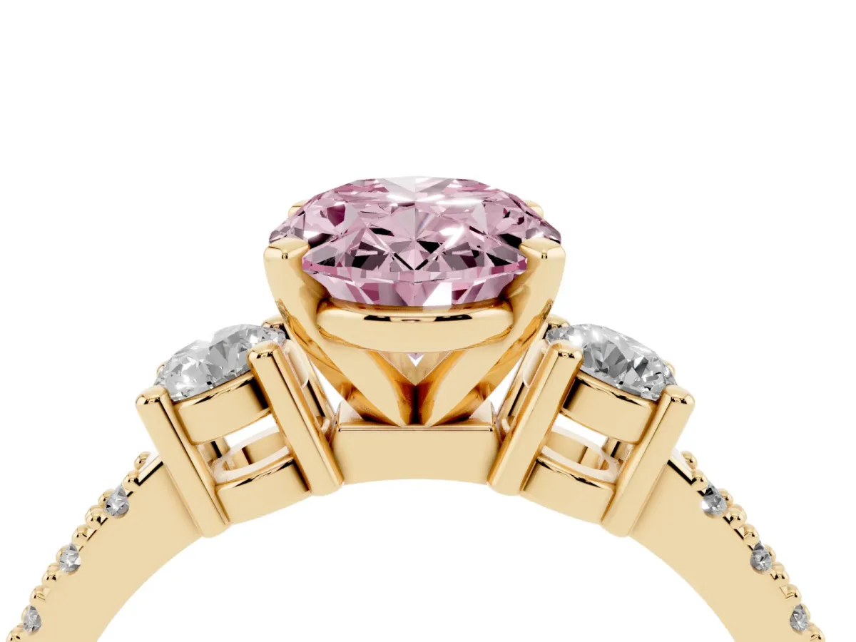 Fancy Pink Oval Cut Three-Stone Diamond Pavé Band with Prong Setting Yellow gold