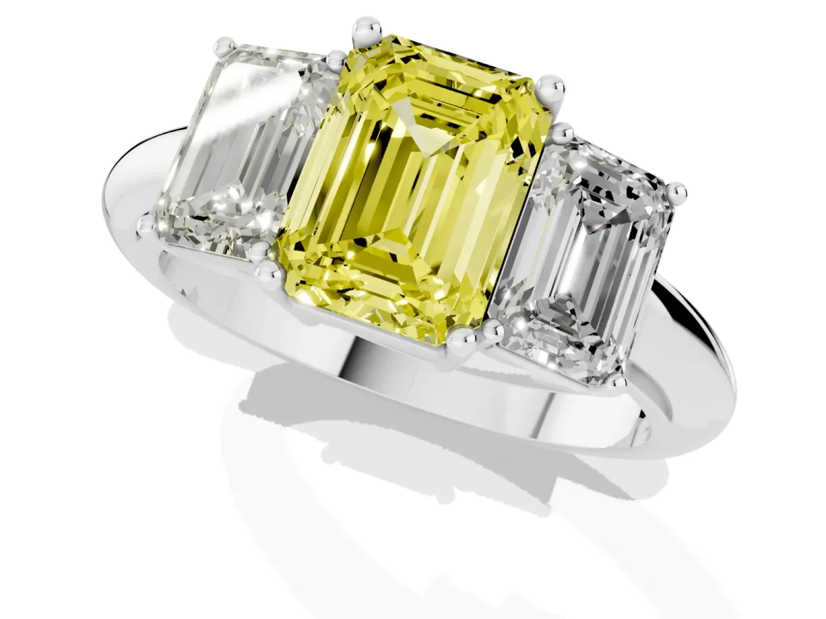 Fancy Yellow Three-Stone Emerald Cut Cut Diamond Engagement Ring with Prong Setting on a White Gold Band Platinum