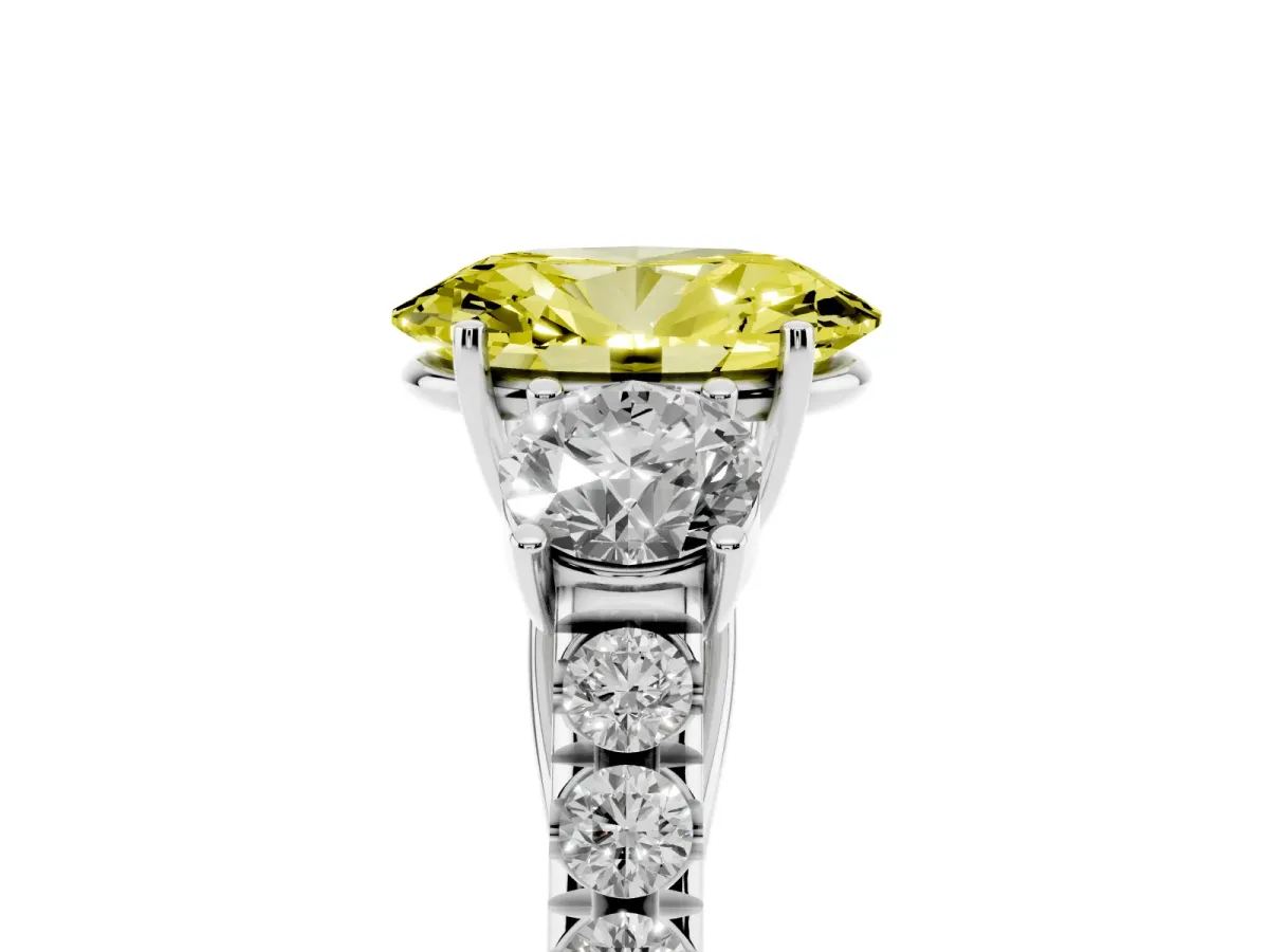 Fancy Yellow Oval Cut Cut Diamond Three-Stone Ring with Round Side Stones and Pavé Band Silver