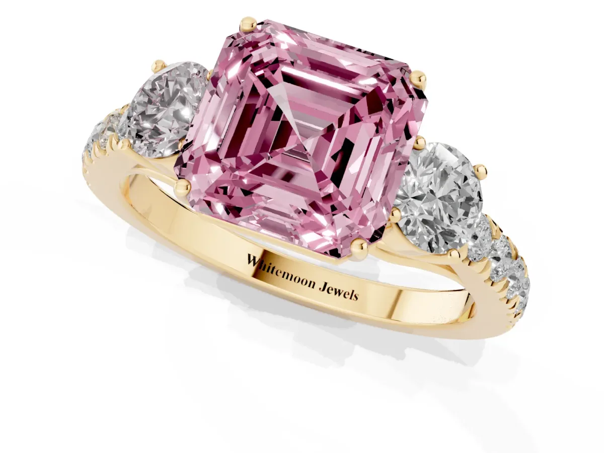 Fancy Pink Asscher Cut Cut Diamond Three-Stone Ring with Round Side Stones and Pavé Band Yellow gold