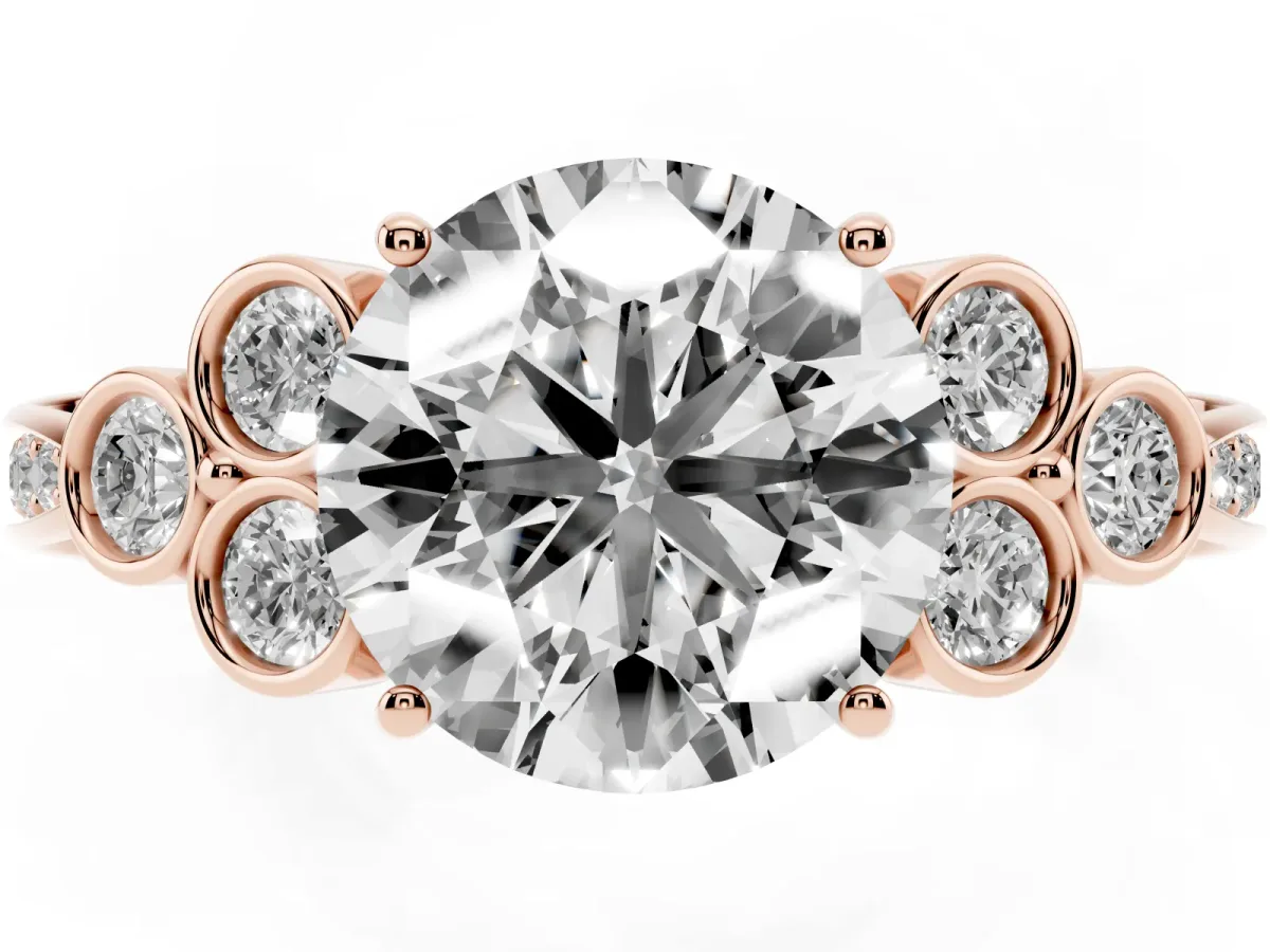 Round Cut Cut Diamond Engagement Ring with Bezel Set Round Side Stones and Prong Setting Rose gold