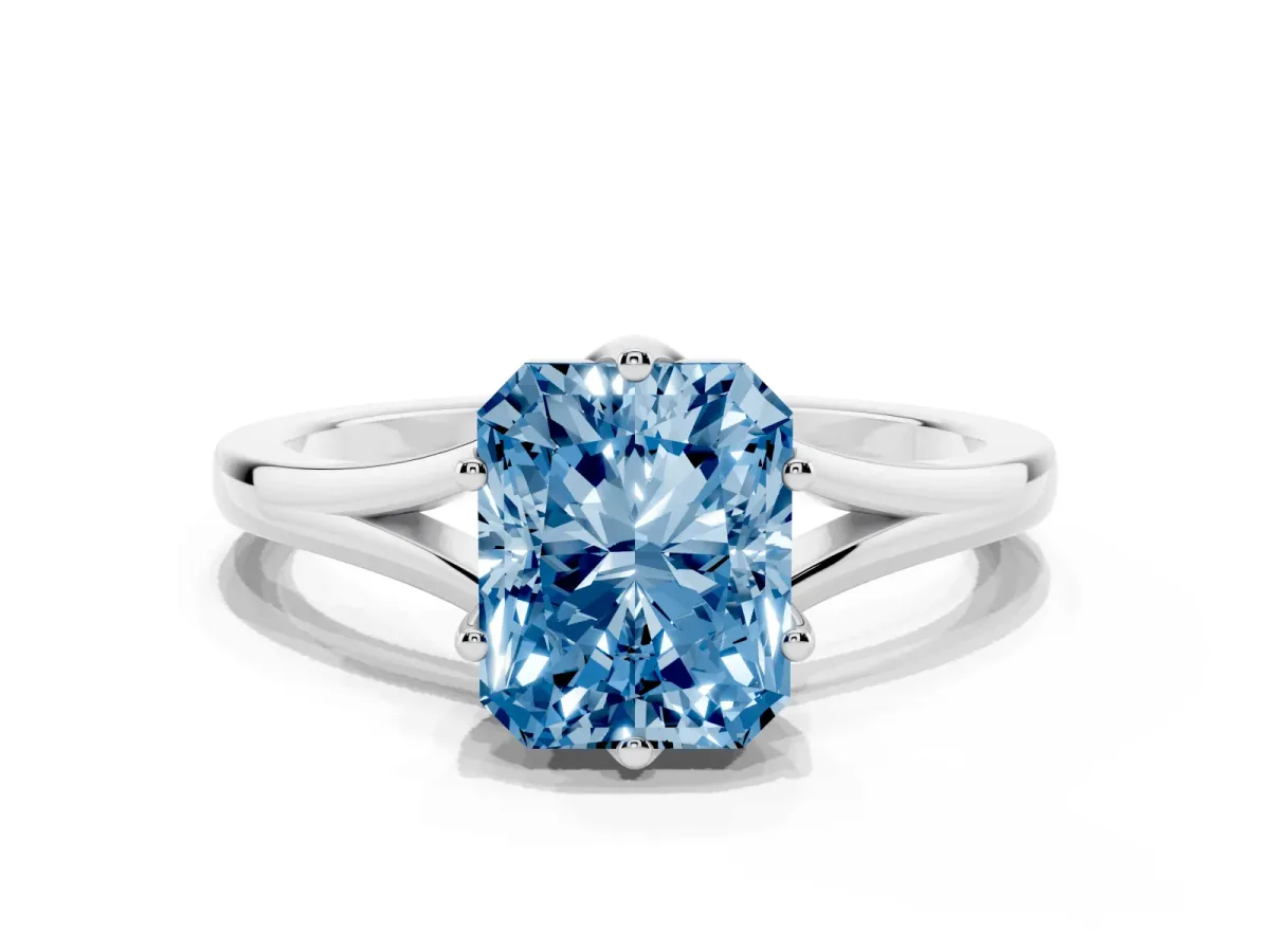 Fancy Blue Radiant Cut Solitaire Diamond Ring with Six-Prong Setting and Tapered Band Silver