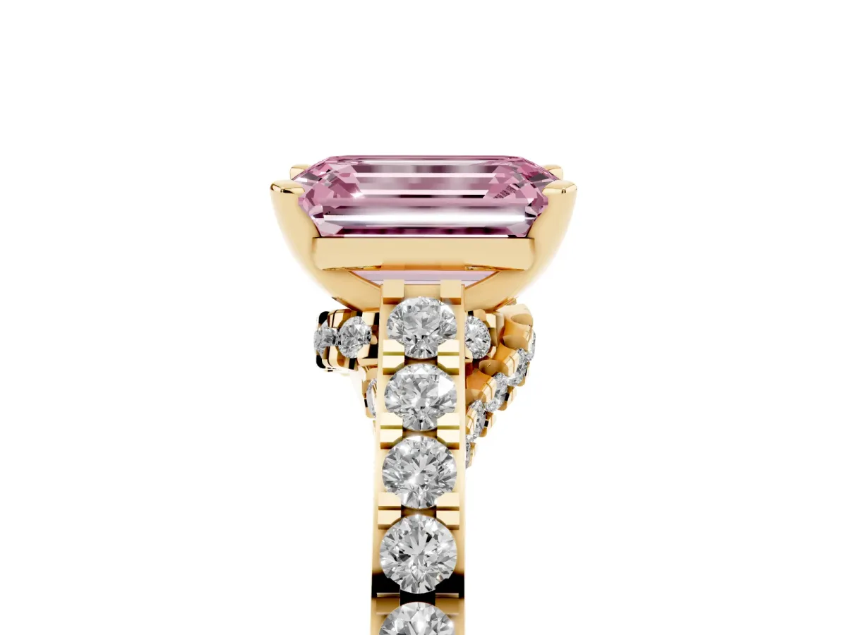 Fancy Pink Emerald Cut Diamond Solitaire Ring with Crossover Gallery and Round Pavé Band Yellow gold