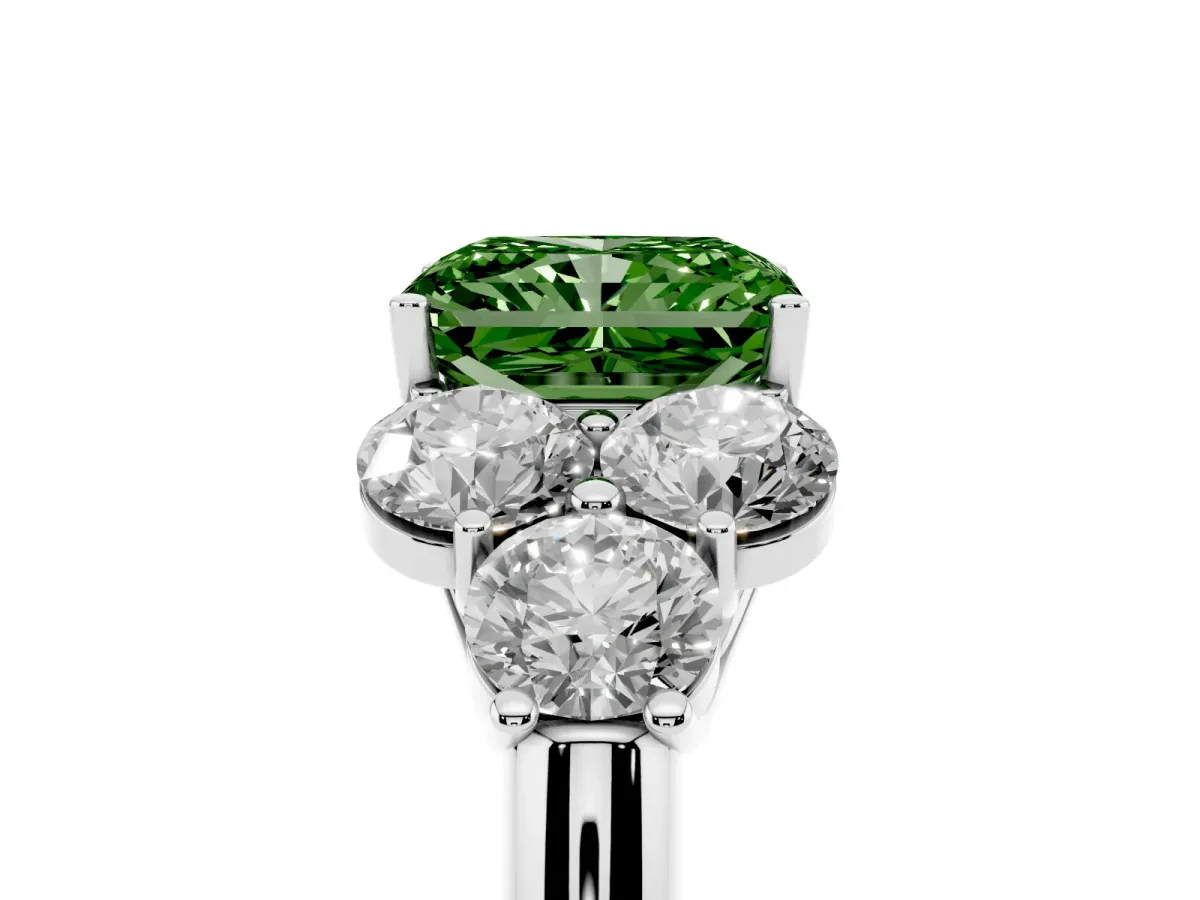 Fancy Green Radiant Cut Cut Diamond Cluster Ring with Round Accent Stones and Prong Setting on a Classic Band Silver