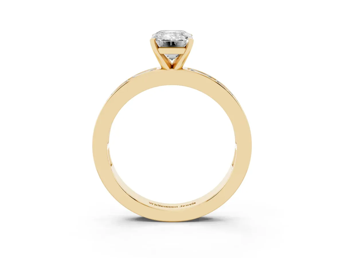 Emerald Cut Solitaire Diamond Ring with Channel-Set Baguette Band and Four-Prong Setting Yellow gold