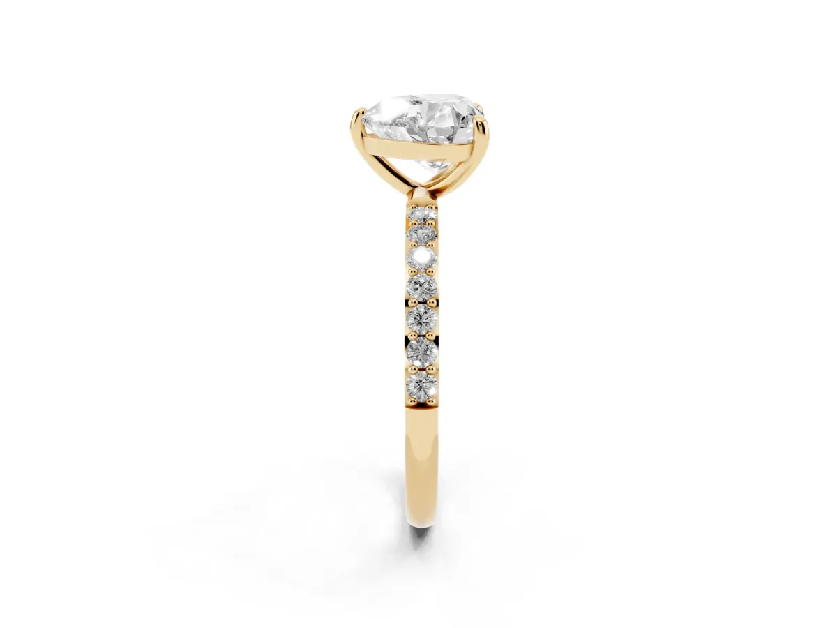 Heart Cut Diamond Solitaire Ring with Round Pavé Band and Prong Setting Yellow gold