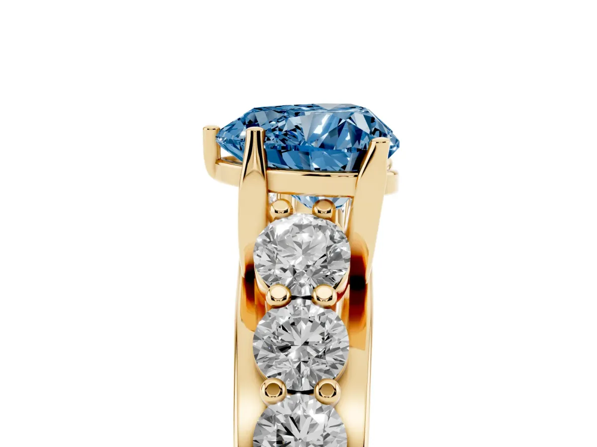 Fancy Blue Heart Cut Diamond Engagement Ring with Pavé Band and Four-Prong Setting Yellow gold