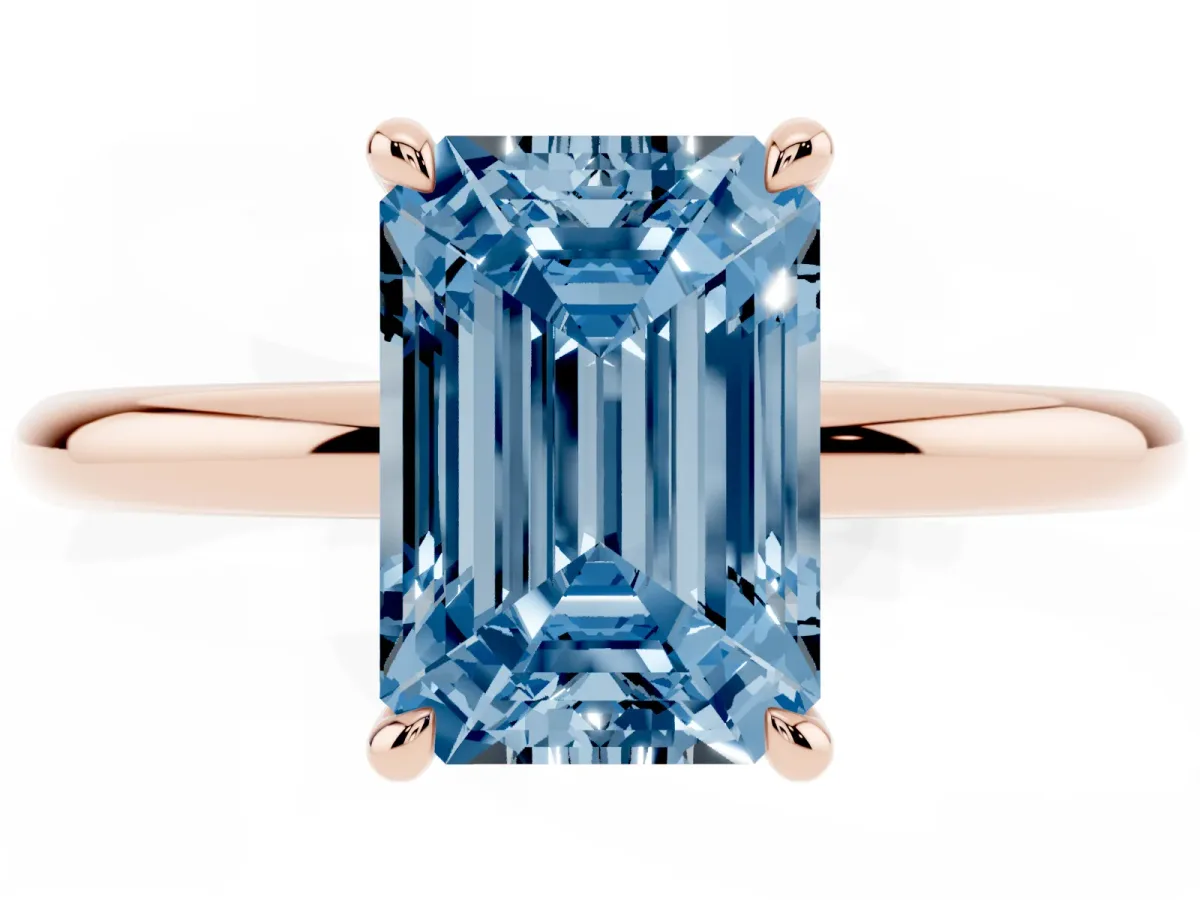Fancy Blue Emerald Cut Diamond Solitaire Ring with Thin Band and Four-Prong Setting Rose gold