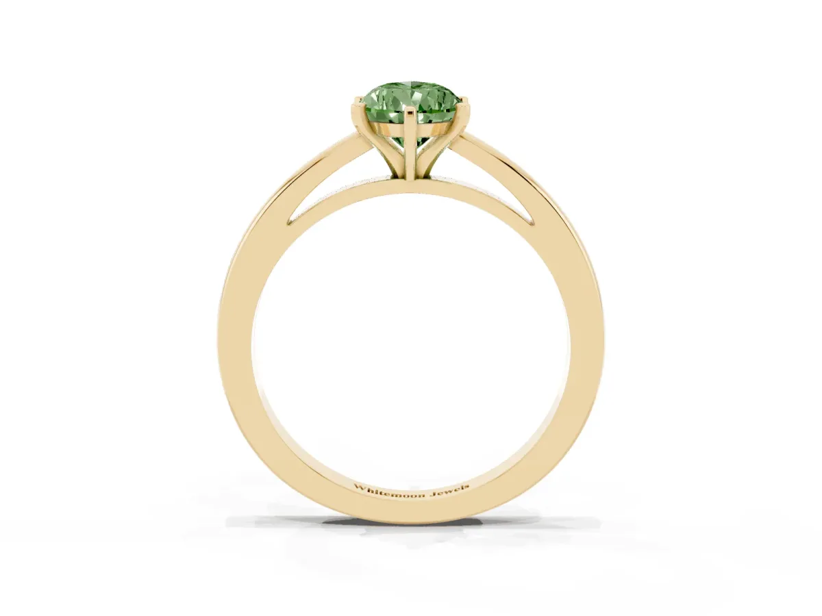Fancy Green Pear Cut Solitaire Diamond Engagement Ring with Four-Prong Setting on a Classic Band Yellow gold