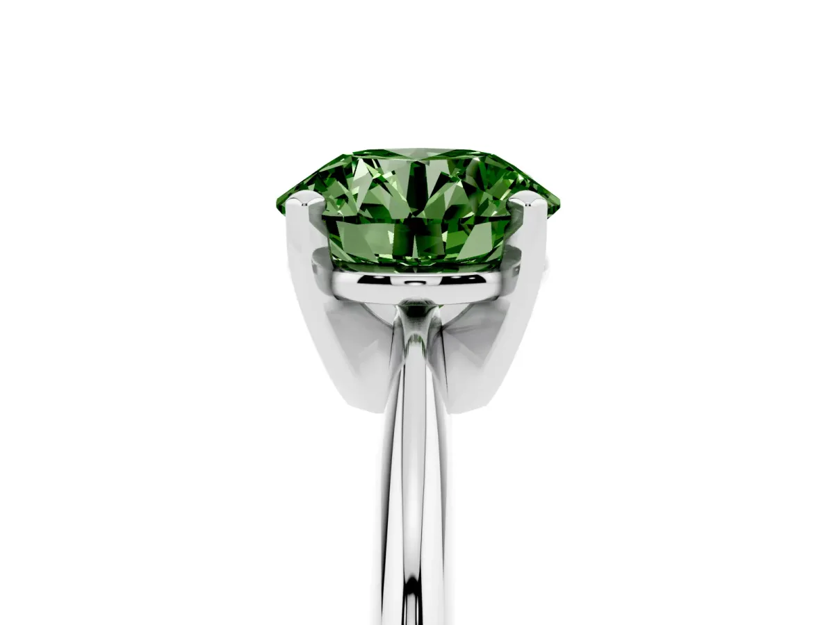 Fancy Green Round Cut Cut Solitaire Ring with Four-Prong Setting on a Classic Band Silver