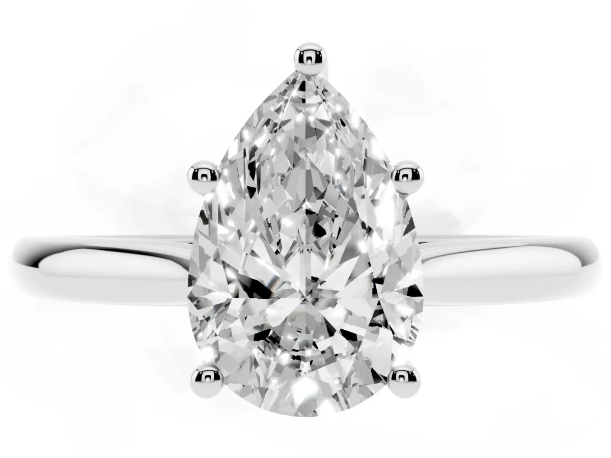 Pear Cut Cut Solitaire Ring with Cathedral Band and Four-Prong Setting Silver