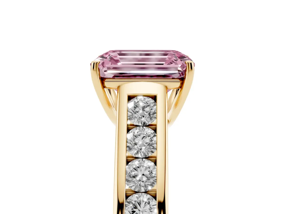 Fancy Pink Emerald Cut Brilliant Channel-Set Solitaire Ring with Four-Prong Setting Yellow gold