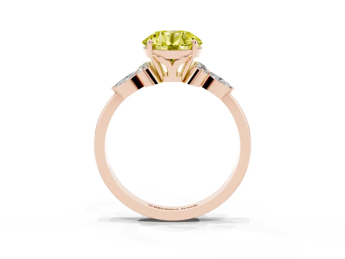 Fancy Yellow Round Cut Brilliant Diamond Solitaire Ring with Pear Side Stones and Four-Prong Setting Rose gold