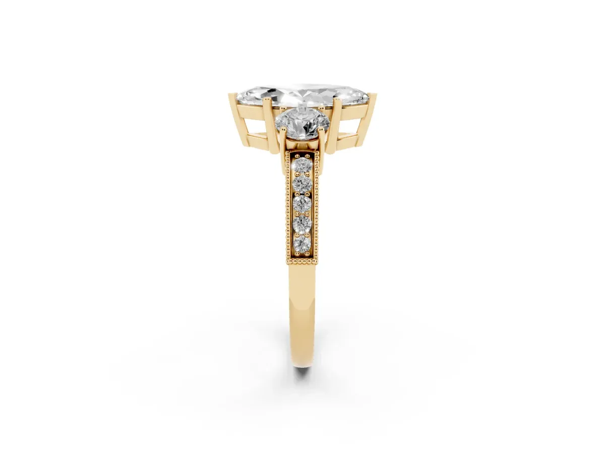 Marquise Cut Three-Stone Diamond Ring with Pavé Band and Four-Prong Setting Yellow gold