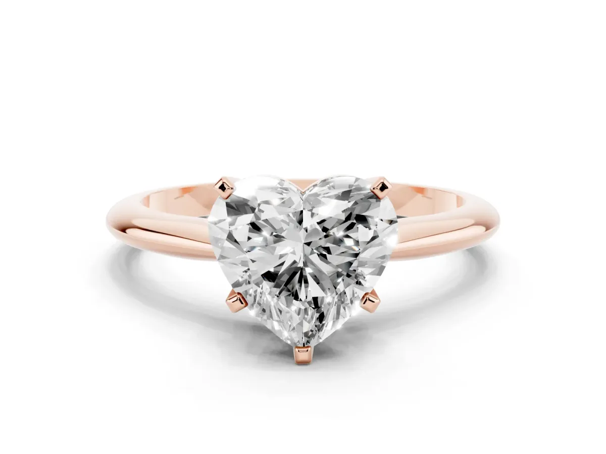 Heart Cut Cut Solitaire Ring with Four-Prong Setting on a Classic Band Rose gold