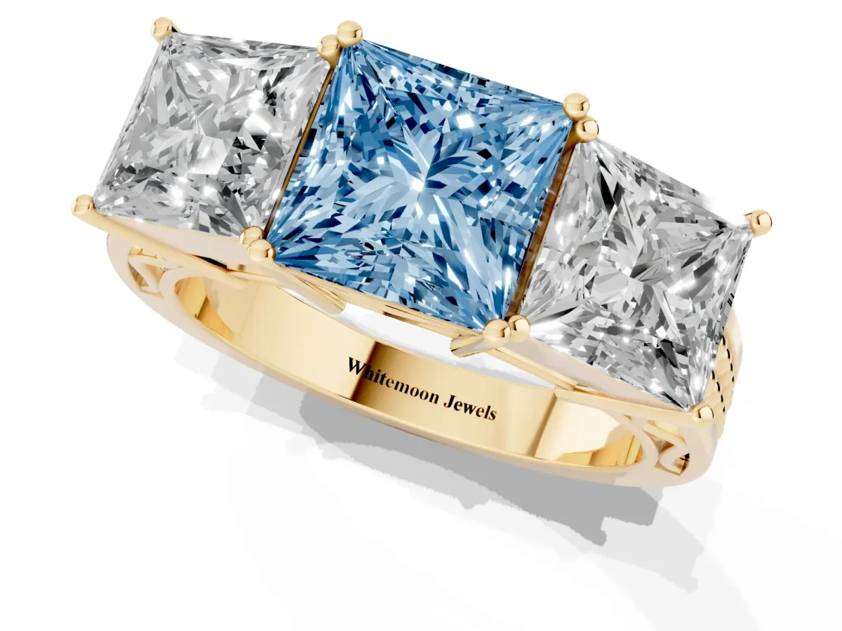 Fancy Blue Princess Cut Diamond Three-Stone Ring with Prong Setting and Textured Band Yellow gold