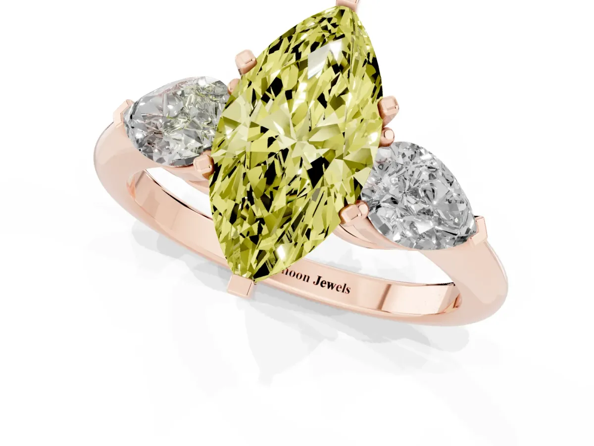 Fancy Yellow Three-Stone Marquise Cut Diamond Ring with Pear Side Stones and Four-Prong Setting Rose gold