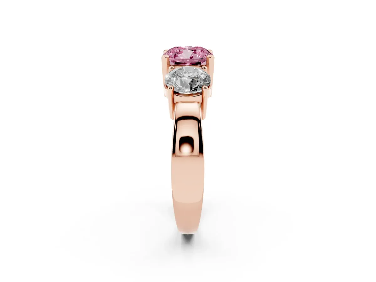 Fancy Pink Three-Stone Cushion Cut Diamond Ring with Round Side Stones, Classic Band, and Four-Prong Setting Rose gold