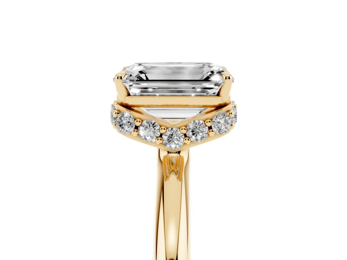 Emerald Cut Brilliant Solitaire Engagement Ring with Six-Prong Setting and Classic Band Yellow gold
