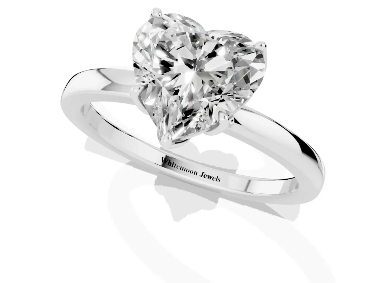 Heart Cut Diamond Solitaire Ring with Thin Band and Prong Setting Silver
