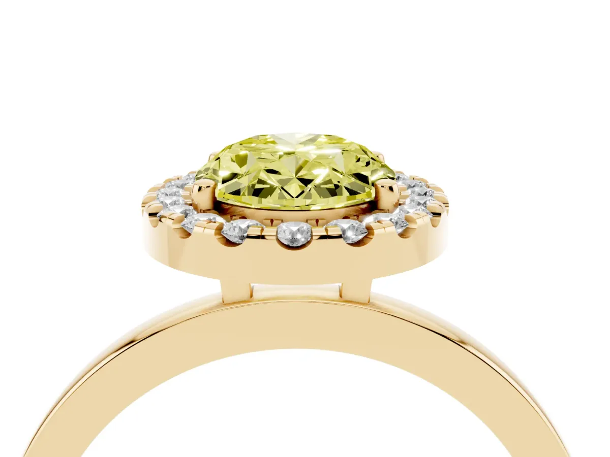 Fancy Yellow Oval Cut Halo Diamond Solitaire with Pavé Band and Four-Prong Setting Yellow gold