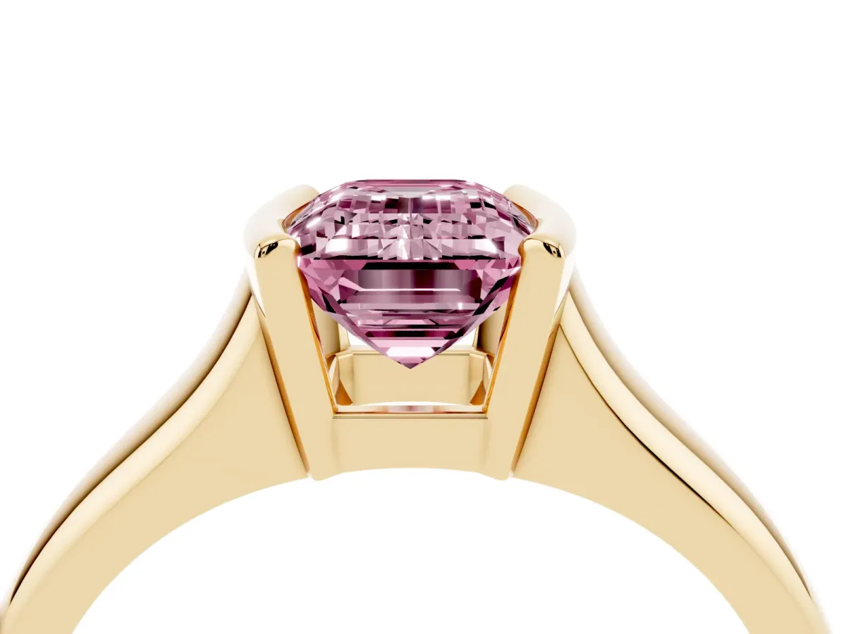Fancy Pink Emerald Cut Solitaire Tension Set Diamond Ring with Split Shank Band Yellow gold