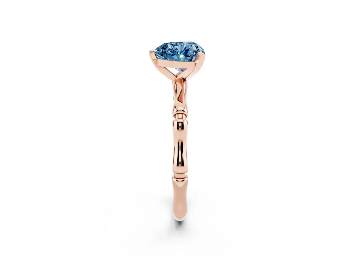 Fancy Blue Heart Cut Solitaire Diamond Ring with Bamboo Band and Four-Prong Setting Rose gold