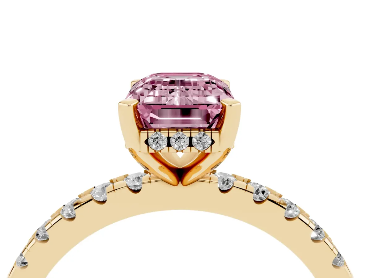 Fancy Pink Emerald Cut Diamond Solitaire Ring with Round Pavé Band and Four-Prong Setting Yellow gold