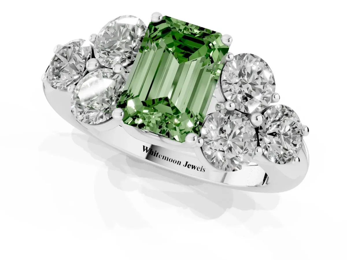 Fancy Green Emerald Cut Cut Diamond Cluster Ring with Round Accent Stones and Prong Setting on a Classic Band White gold