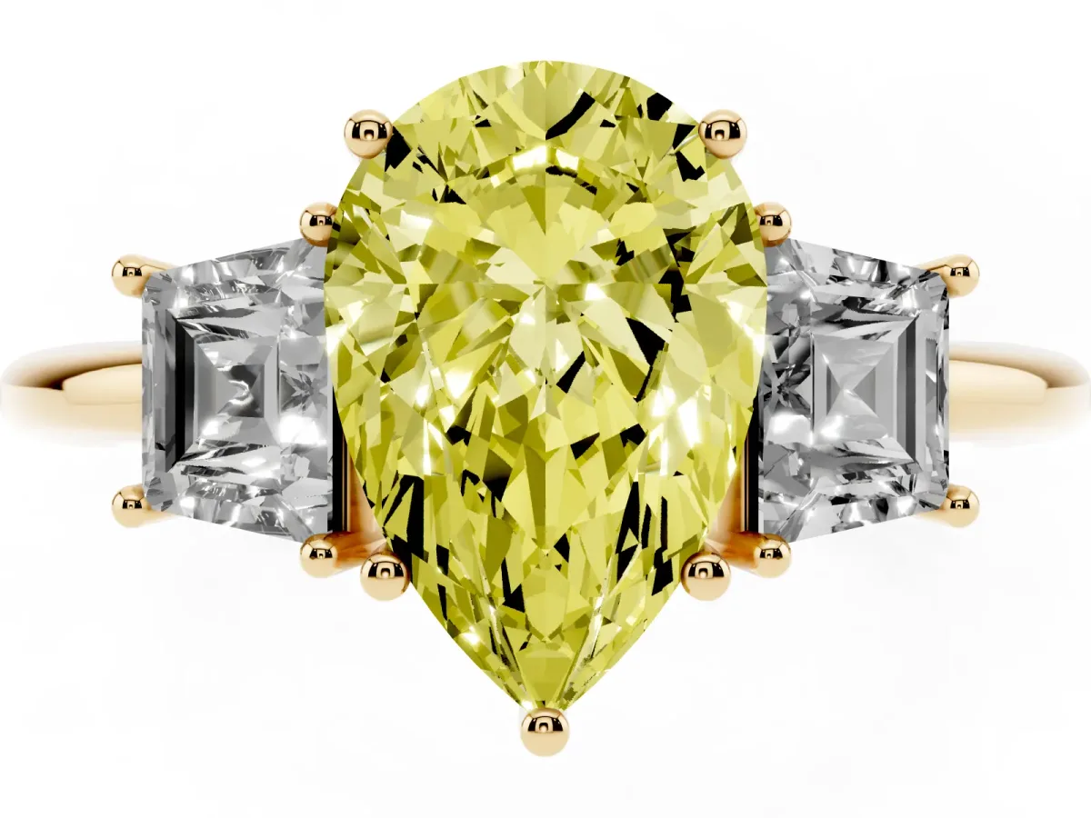 Fancy Yellow Pear Cut Diamond Three-Stone Ring with Trapezoid Side Stones and Prong Setting Yellow gold