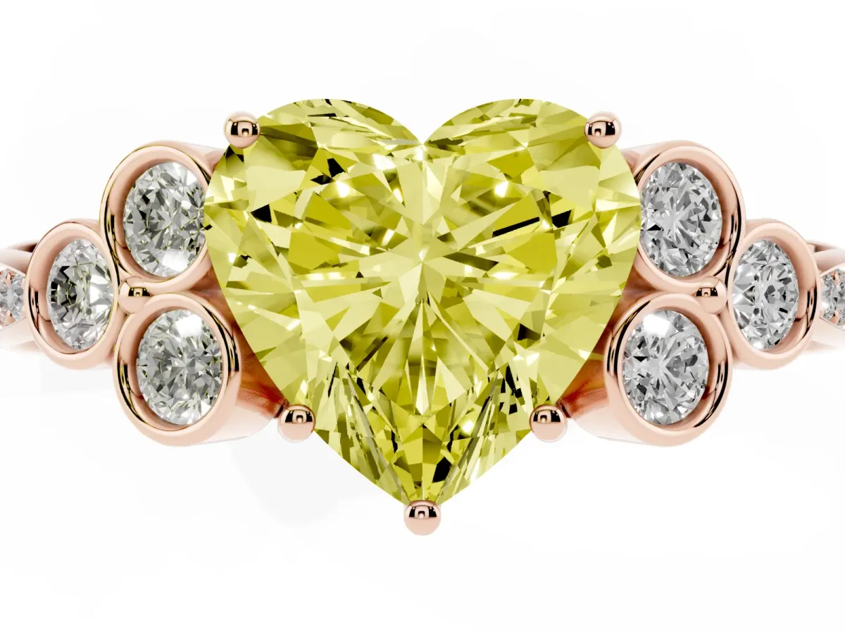 Fancy Yellow Heart Cut Cut Diamond Engagement Ring with Bezel Set Round Side Stones and Prong Setting Rose gold