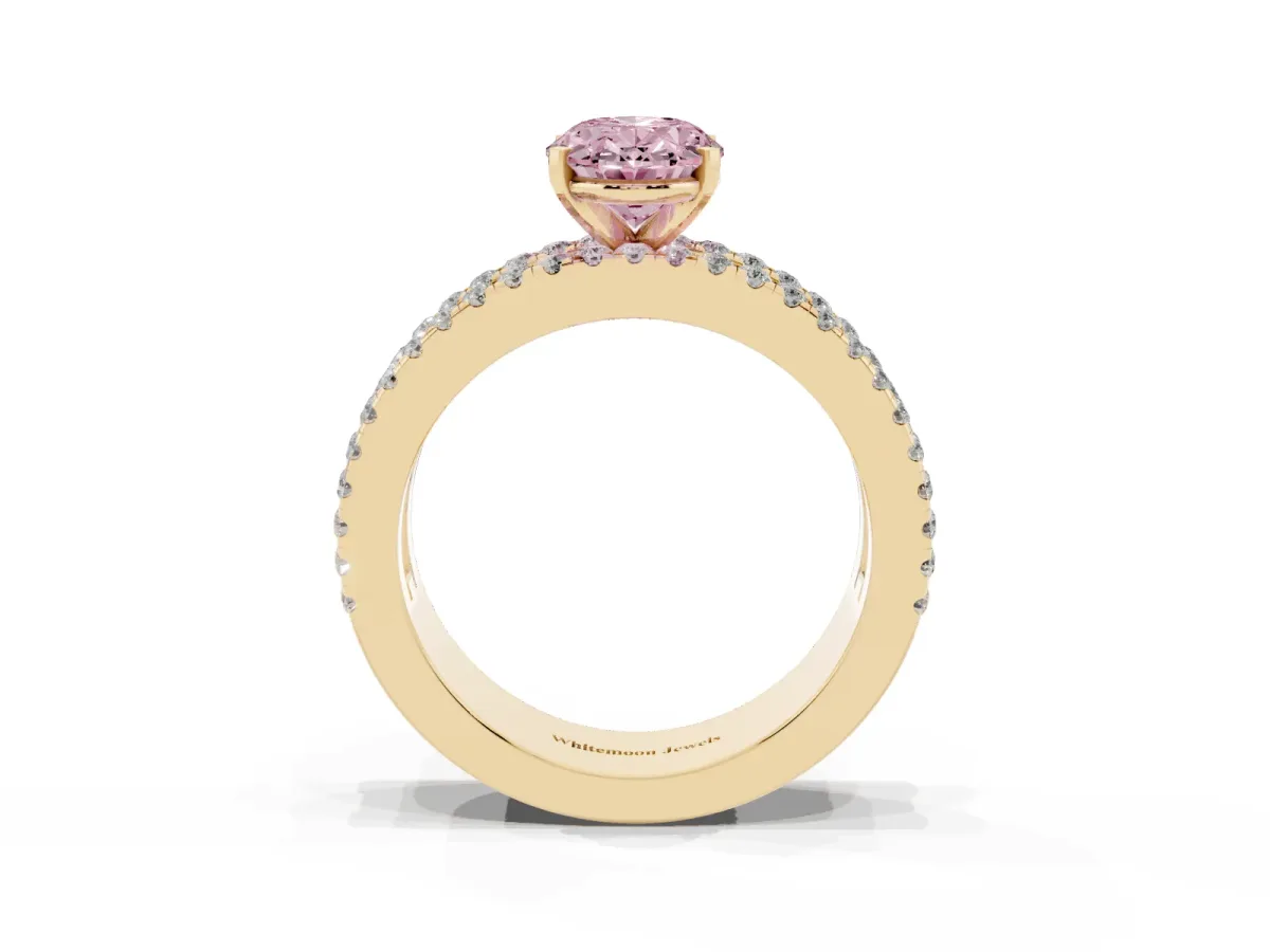 Fancy Pink Oval Cut Diamond Solitaire Ring with Pavé and Channel Set Band Yellow gold