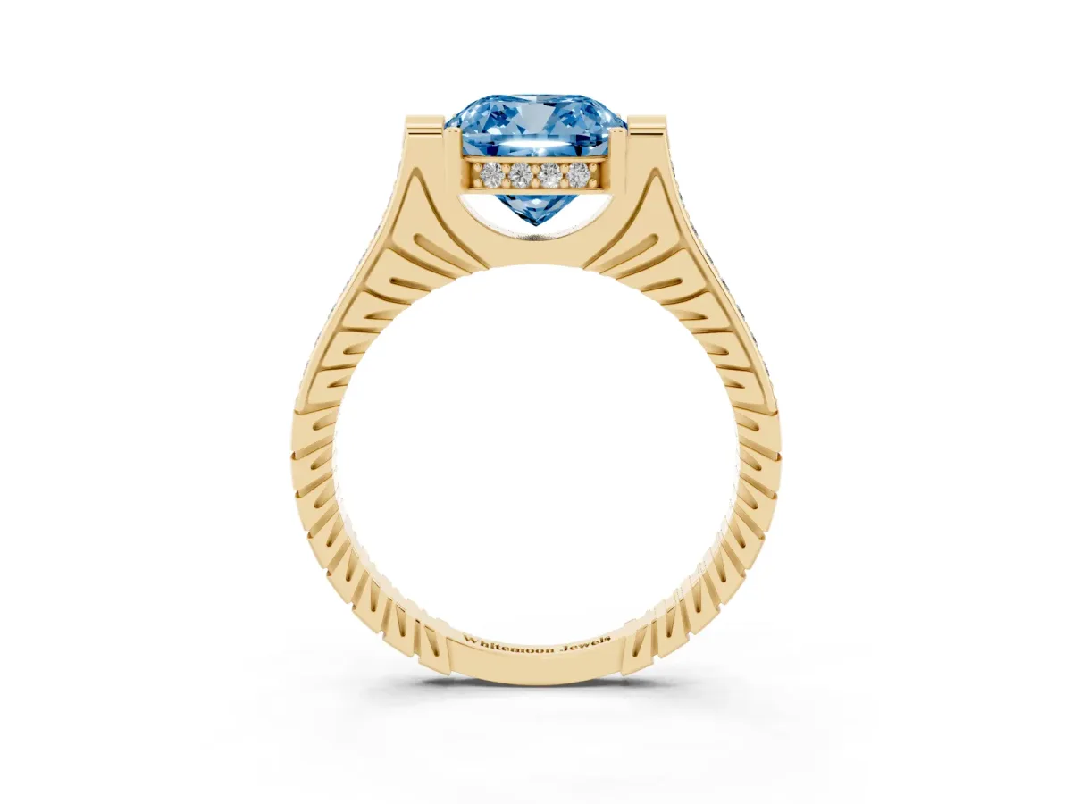 Fancy Blue Cushion Cut Solitaire Diamond Ring with Channel Set Band and Bezel Prong Setting Yellow gold