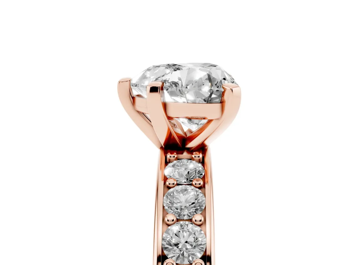 Heart Cut Diamond Engagement Ring with Channel Set Round Band and Prong Setting Rose gold