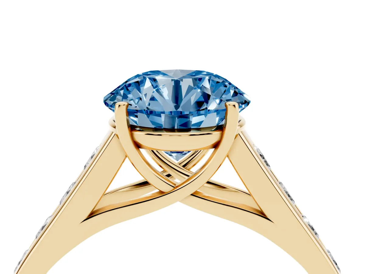 Fancy Blue Round Cut Brilliant Channel-Set Solitaire Ring with Four-Prong Setting Yellow gold