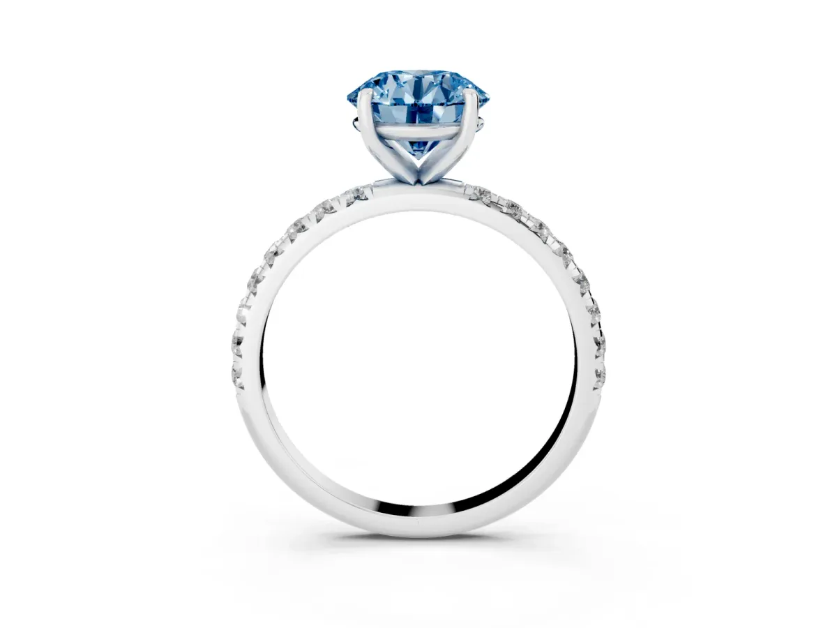 Fancy Blue Round Cut Cut Diamond Solitaire Ring with Micro Pave Band and Four Prong Setting Platinum
