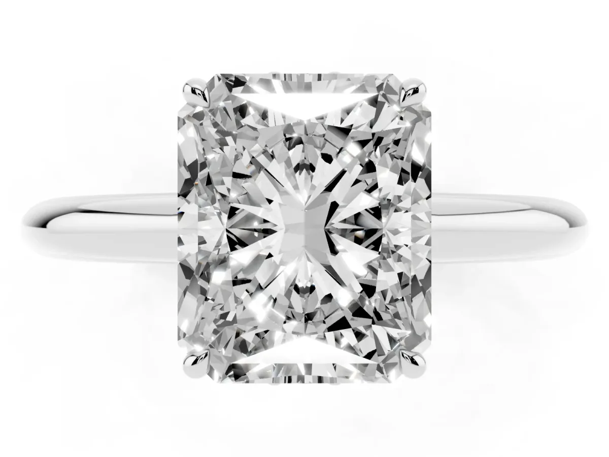 Radiant Cut Brilliant Solitaire Engagement Ring with Six-Prong Setting and Classic Band Platinum