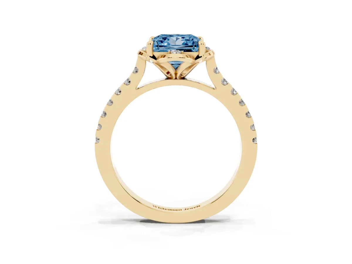 Fancy Blue Princess Cut Diamond Ring with Pavé Band and Floral Prong Setting Yellow gold
