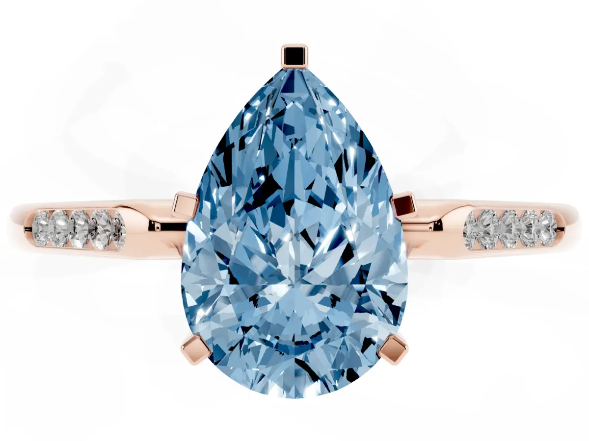 Fancy Blue Pear Cut Diamond Solitaire Ring with Channel Set Round Band and Prong Setting Rose gold