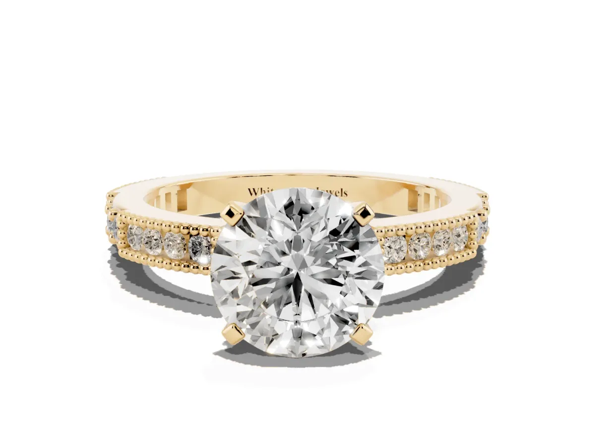 Round Cut Solitaire with Pavé Band and Four-Prong Setting Yellow gold