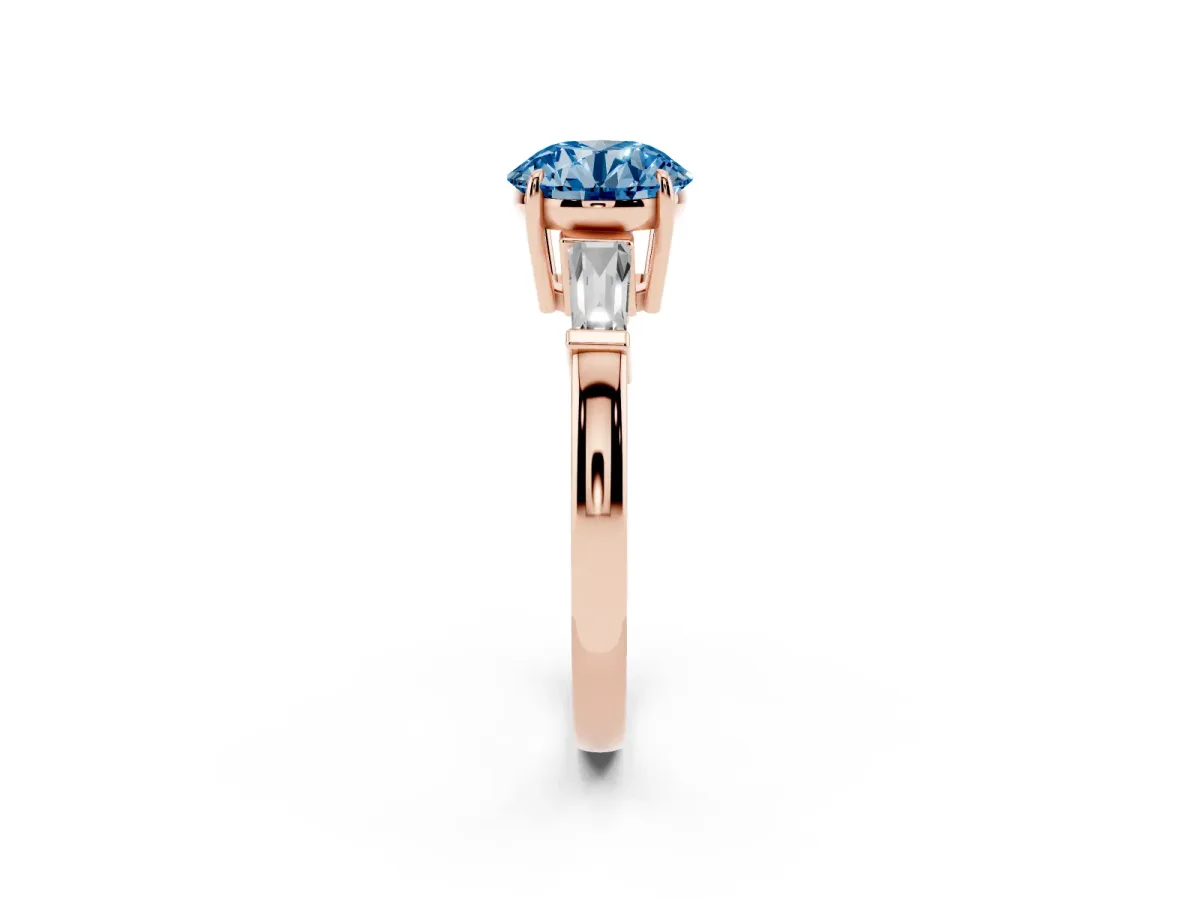 Fancy Blue Round Cut Diamond Three-Stone Ring with Tapered Baguette Side Stones and Prong Setting Rose gold