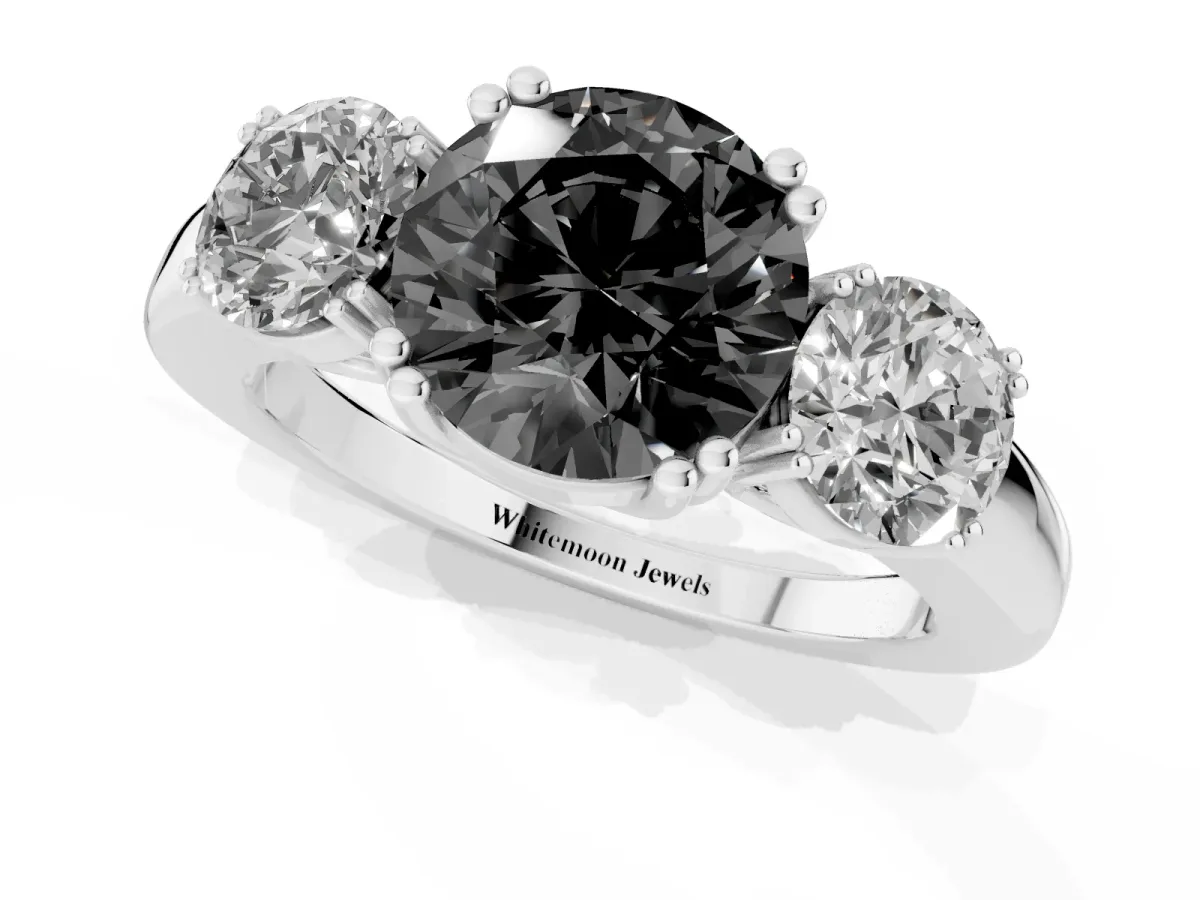 Fancy Black Three-Stone Round Cut Cut Diamond Ring with Channel Set Band and Four-Prong Setting Platinum