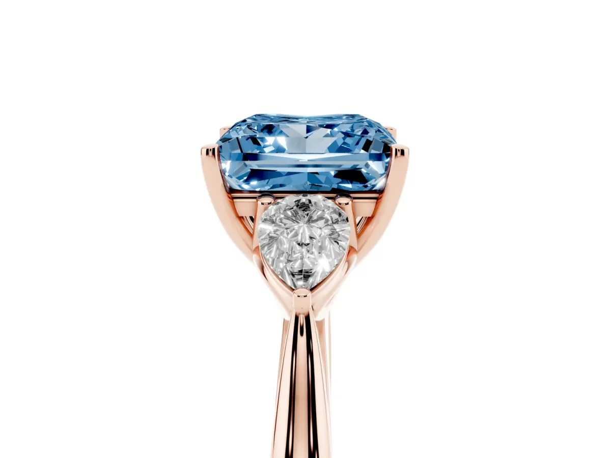 Fancy Blue Three-Stone Princess Cut Brilliant Diamond Solitaire Ring with Tapered Band and Four-Prong Setting Rose gold