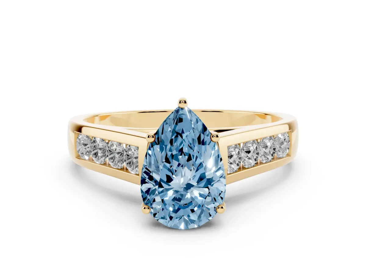 Fancy Blue Pear Cut Brilliant Channel-Set Solitaire Ring with Four-Prong Setting Yellow gold