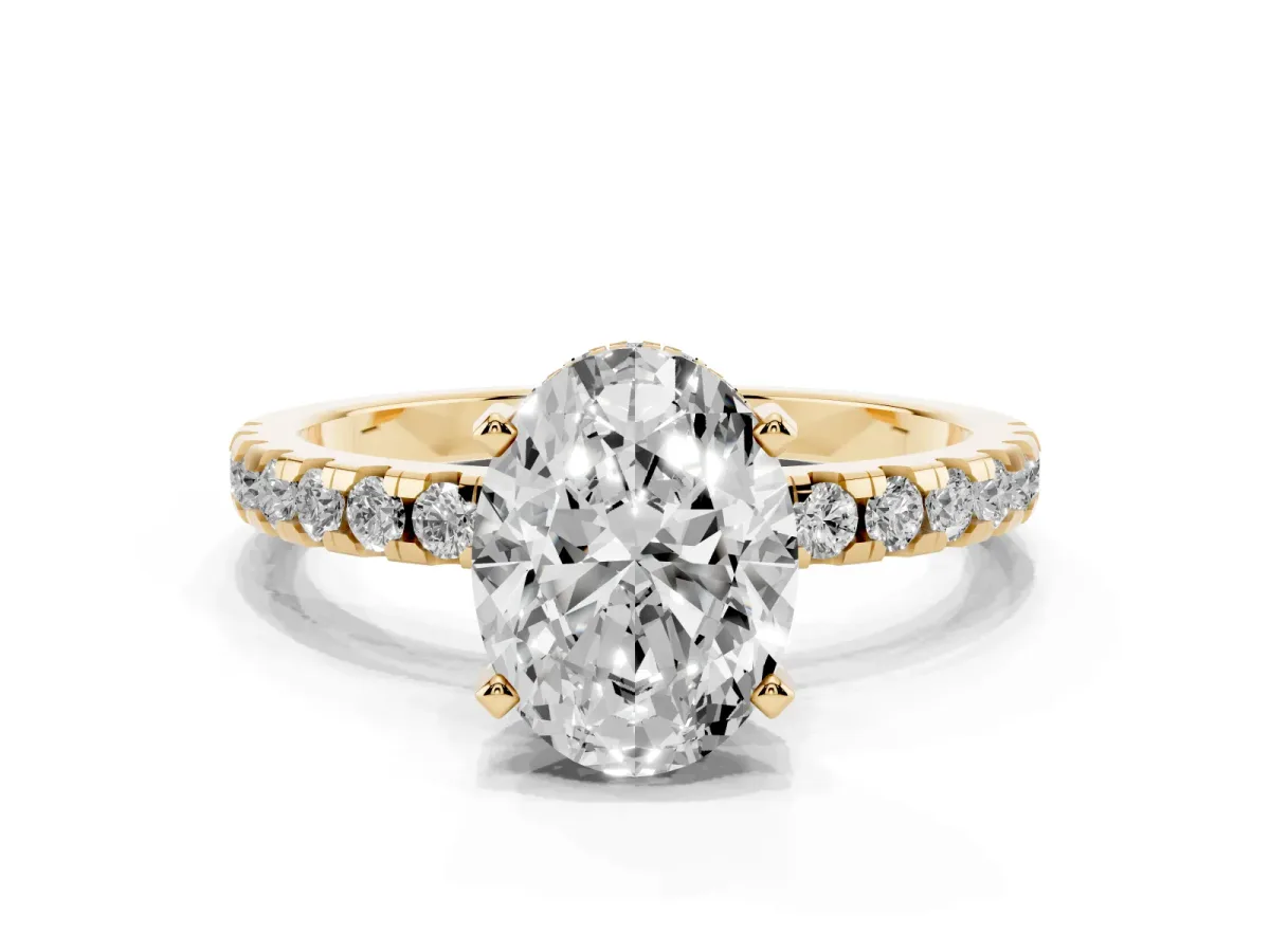 Oval Cut Diamond Solitaire Ring with Round Pavé Band and Four-Prong Setting Yellow gold